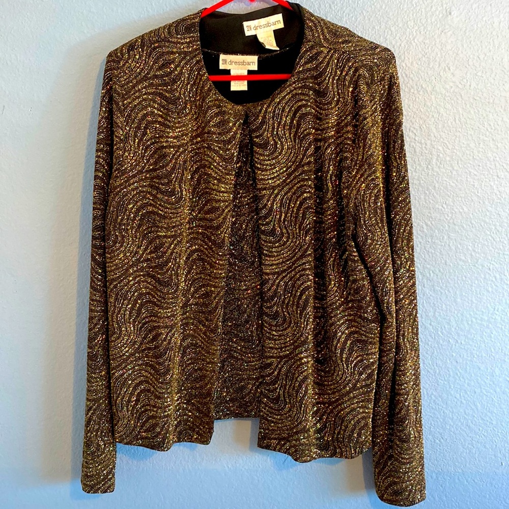 Jacket & blouse. Jacket long sleeve, padded shoulders, short sleeve blouse.